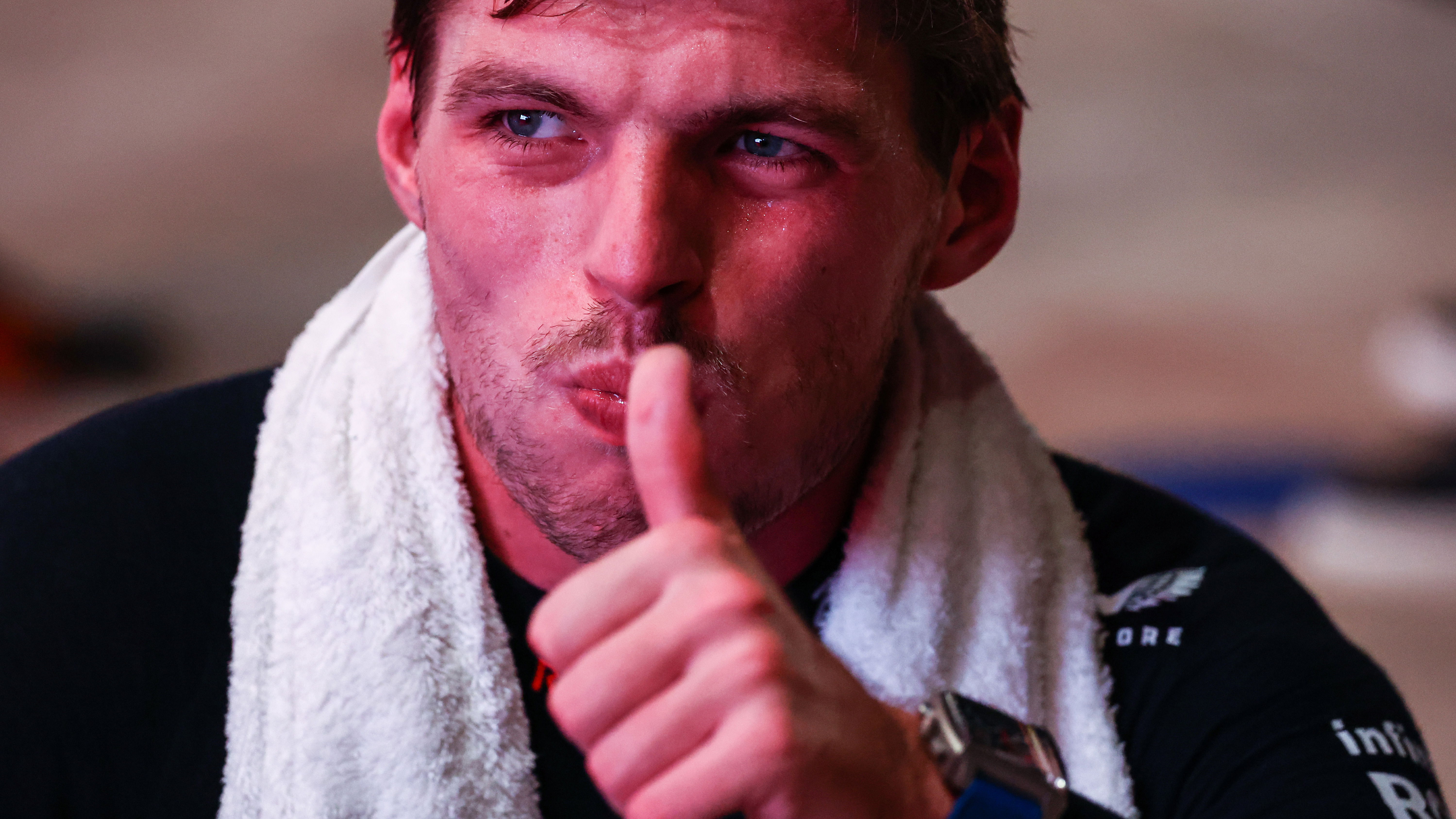 Max Verstappen sitting down after the 2023 Qatar Grand Prix.