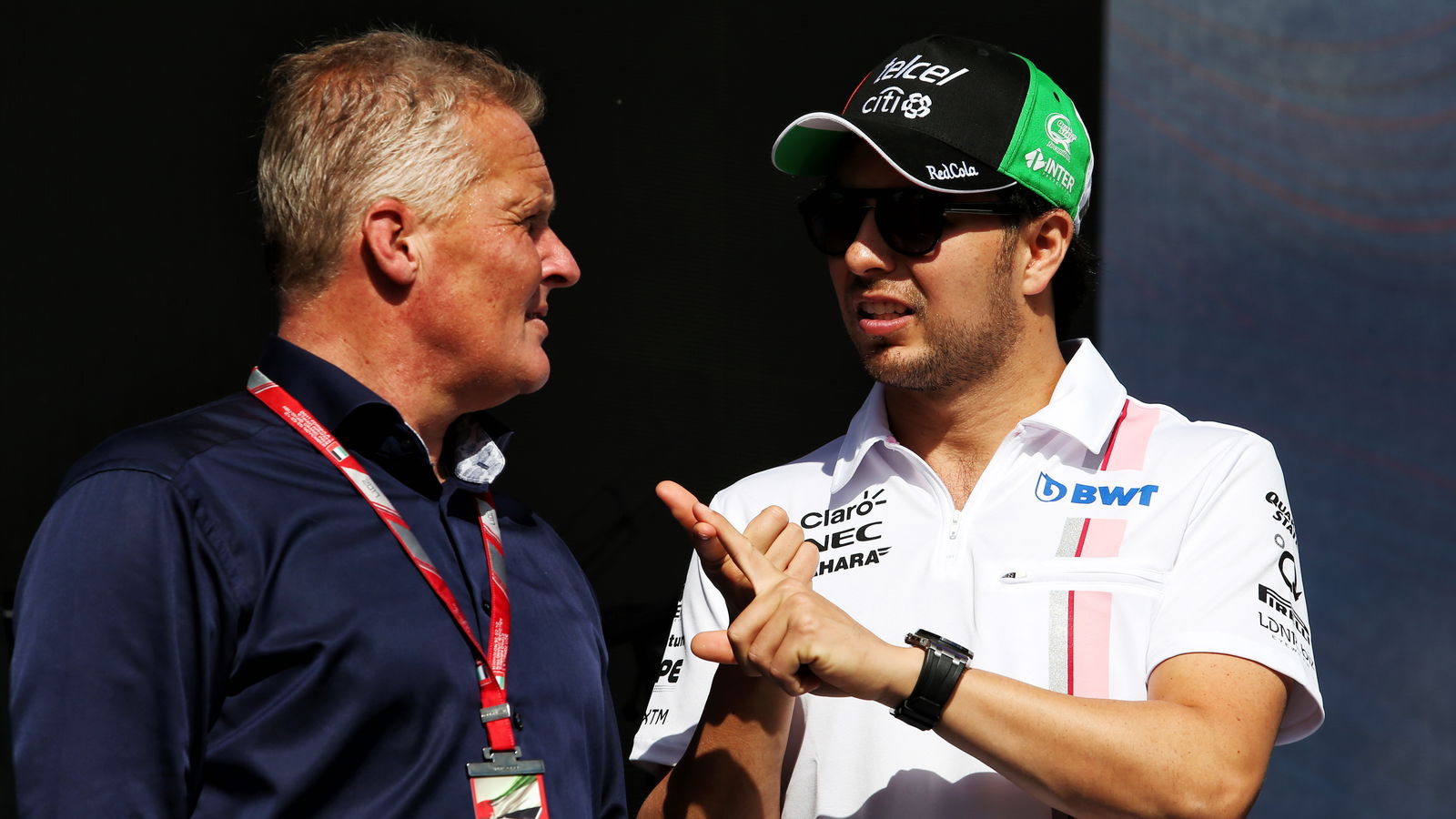 Johnny Herbert talking to Sergio Perez.