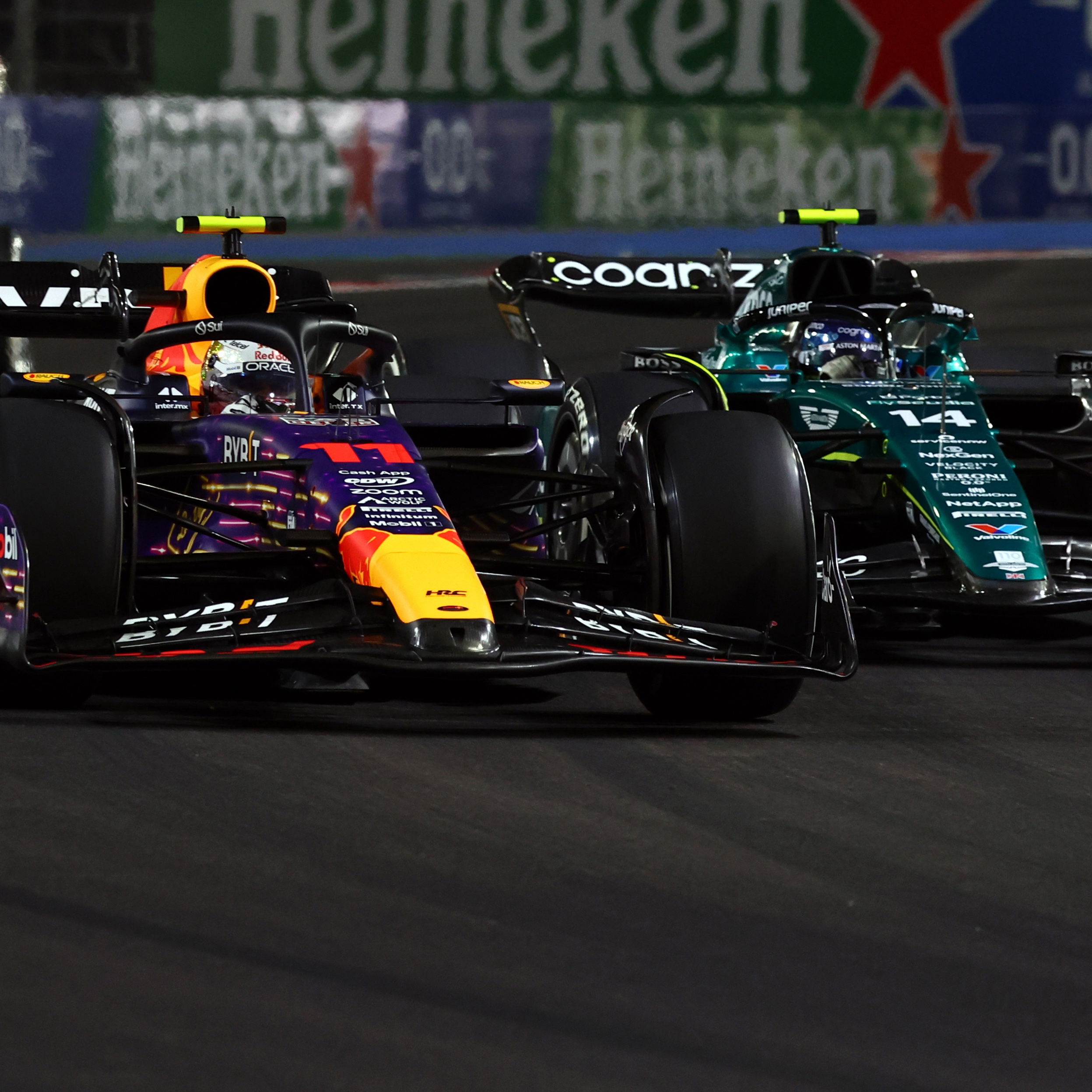 Fernando Alonso battles with Sergio Perez 