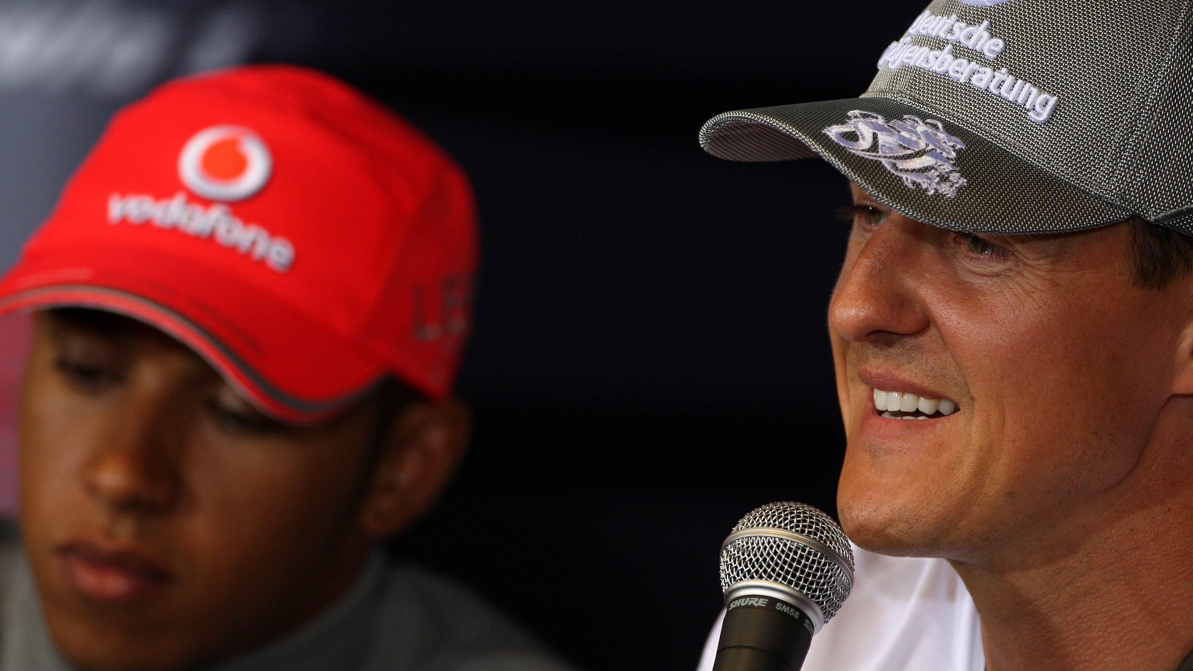 Lewis Hamilton sat alongside Michael Schumacher