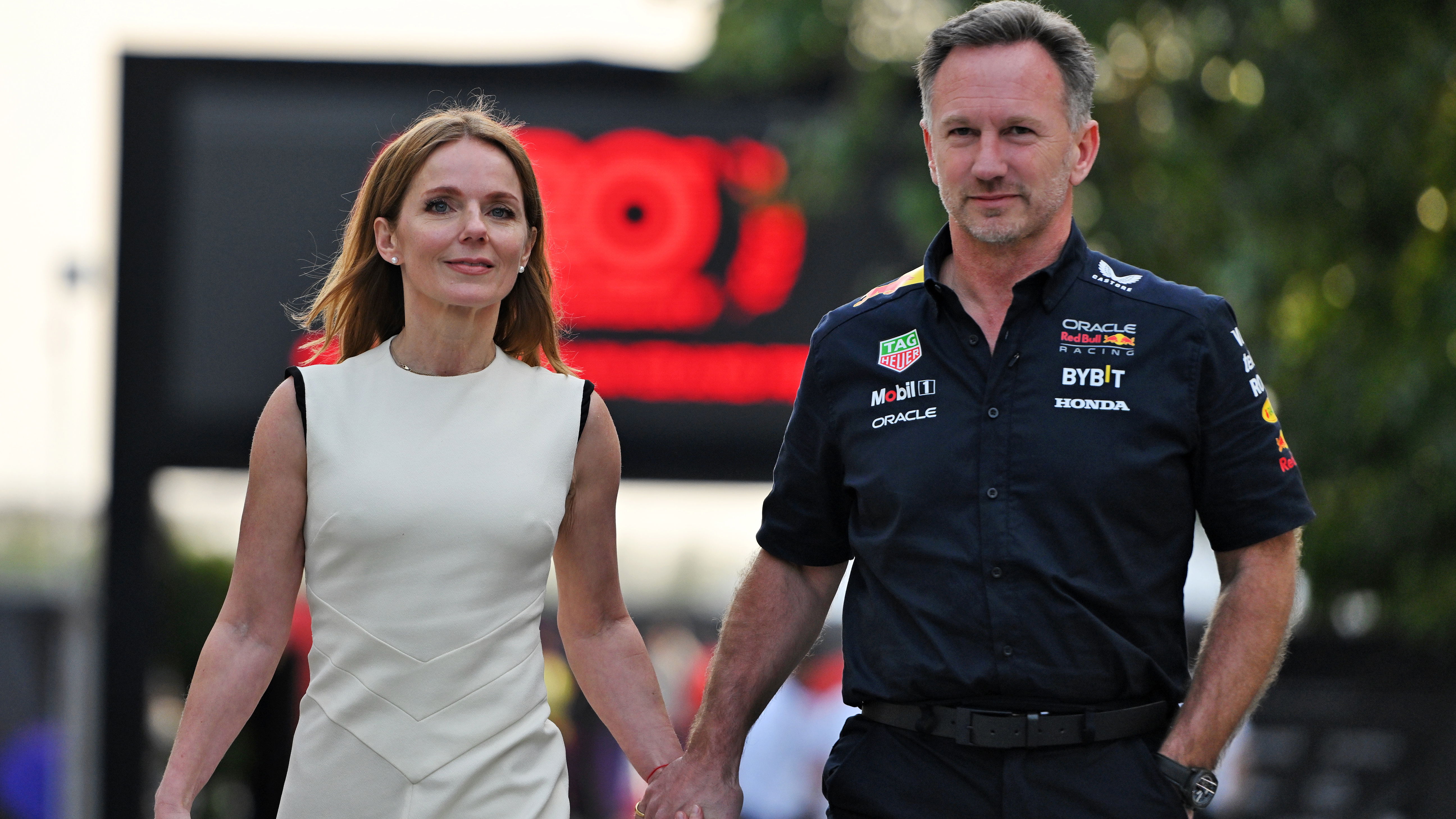 Christian Horner holding hands with wife Geri Horner in Bahrain