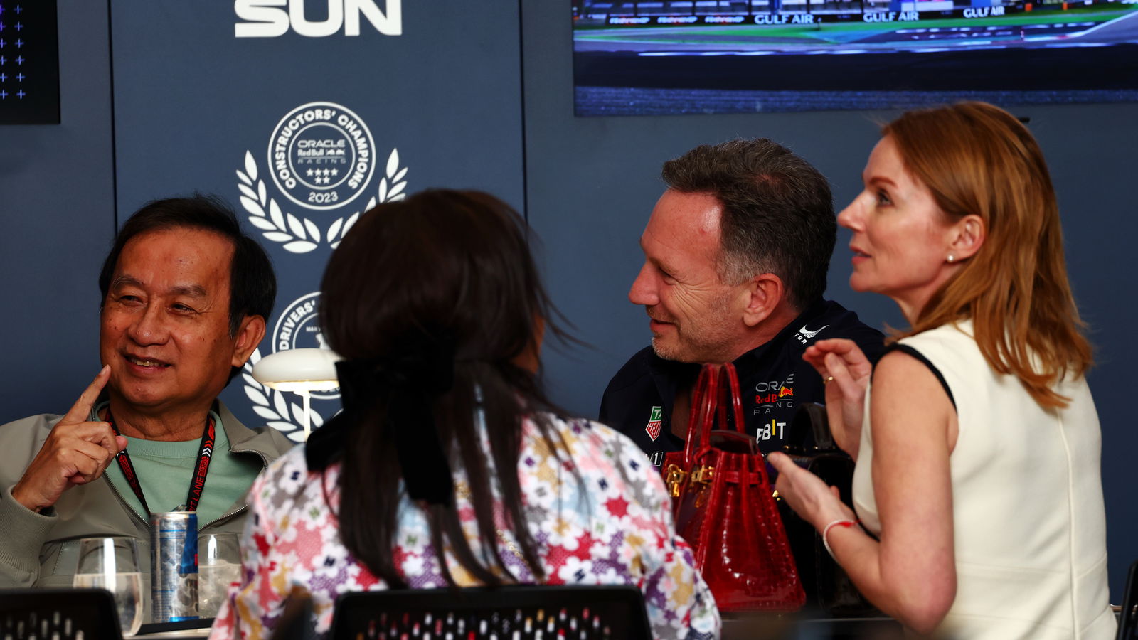 Chalerm Yoovidhya (THA) Red Bull Racing Co-Owner with his wife; Christian Horner (GBR) Red Bull Racing Team Principal, and his wife Geri Horner (GBR) Singer. 