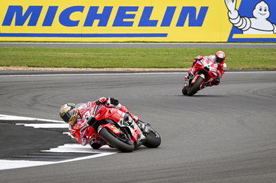 Enea Bastianini leads Francesco Bagnaia, 2024 MotoGP British Grand Prix. Credit: Gold and Goose.