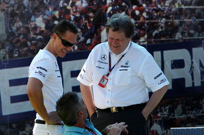 Michael Schumacher with Norbert Haug (Mercedes) and Mick Doohan