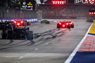 Drivers conduct practice starts on the grid 