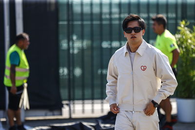 Zhou Guanyu wearing a Dior outfit at Monza 