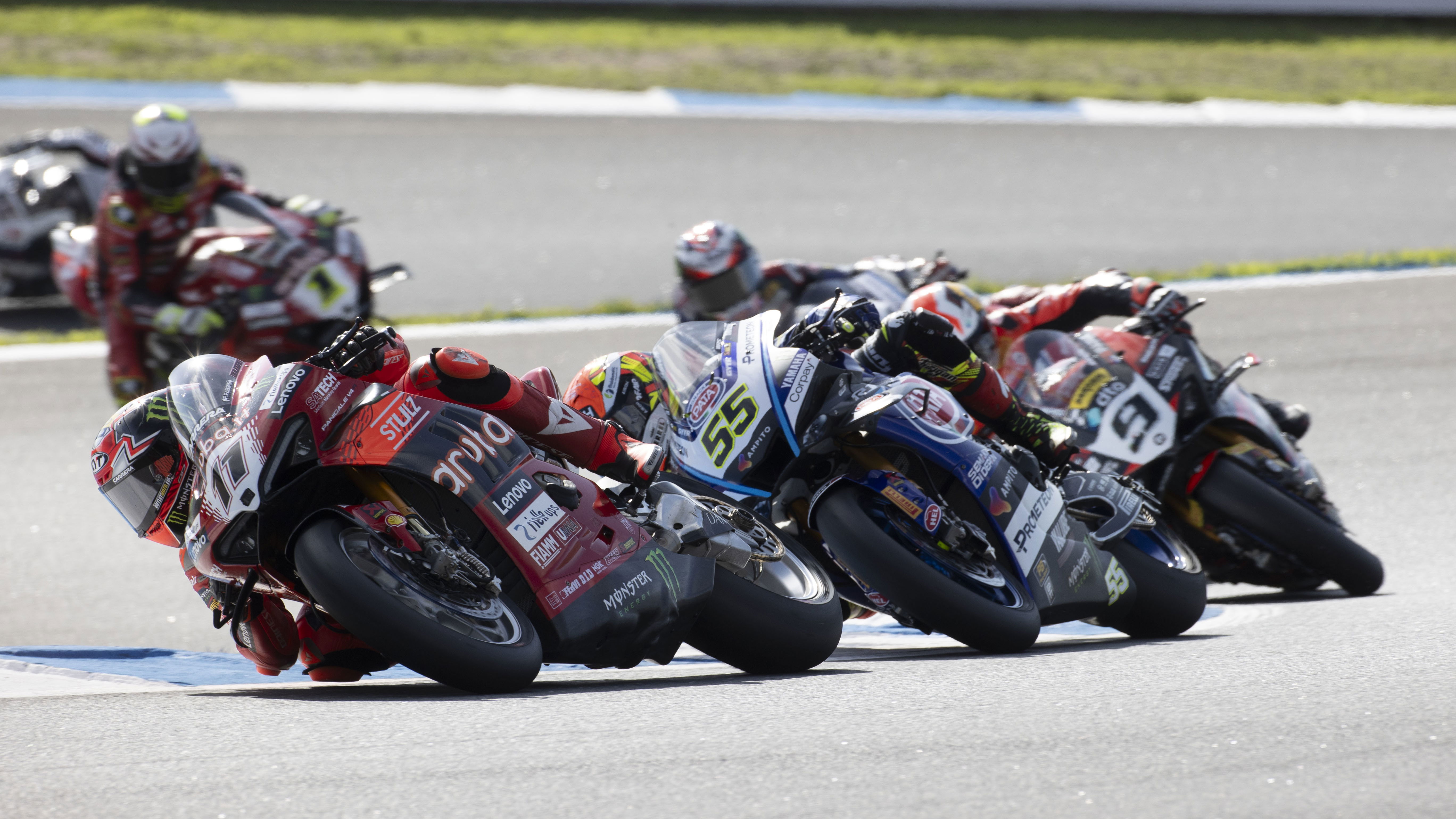 Nicolo Bulega leads Andrea Locatelli, 2024 Estoril WorldSBK. Credit: Gold and Goose.
