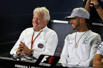 Late FIA race director Charlie Whiting and Lewis Hamilton 