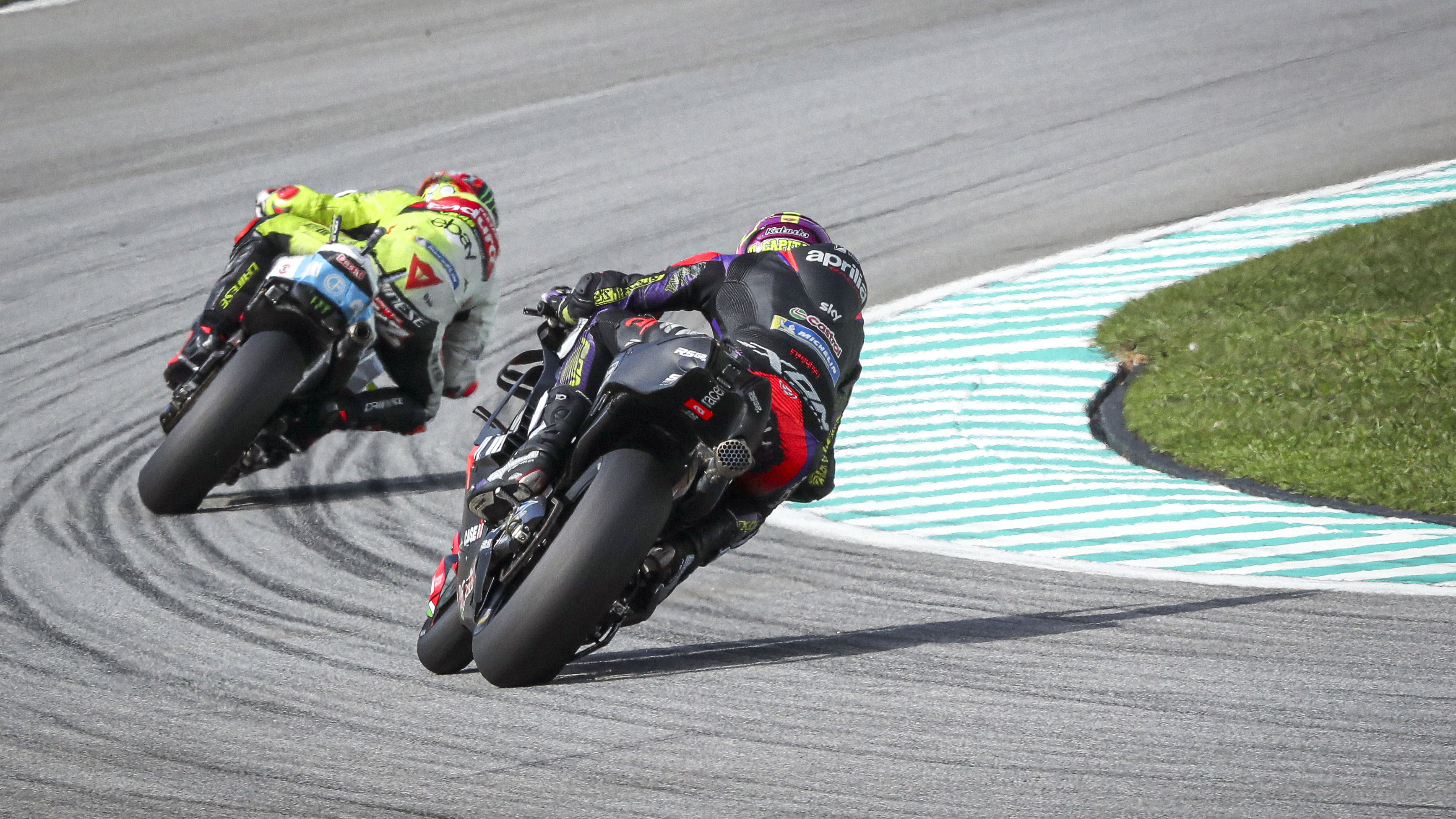 Aleix Espargaro, Marco Bezzecchi, 2024 MotoGP Malaysian Grand Prix. Credit: Gold and Goose.