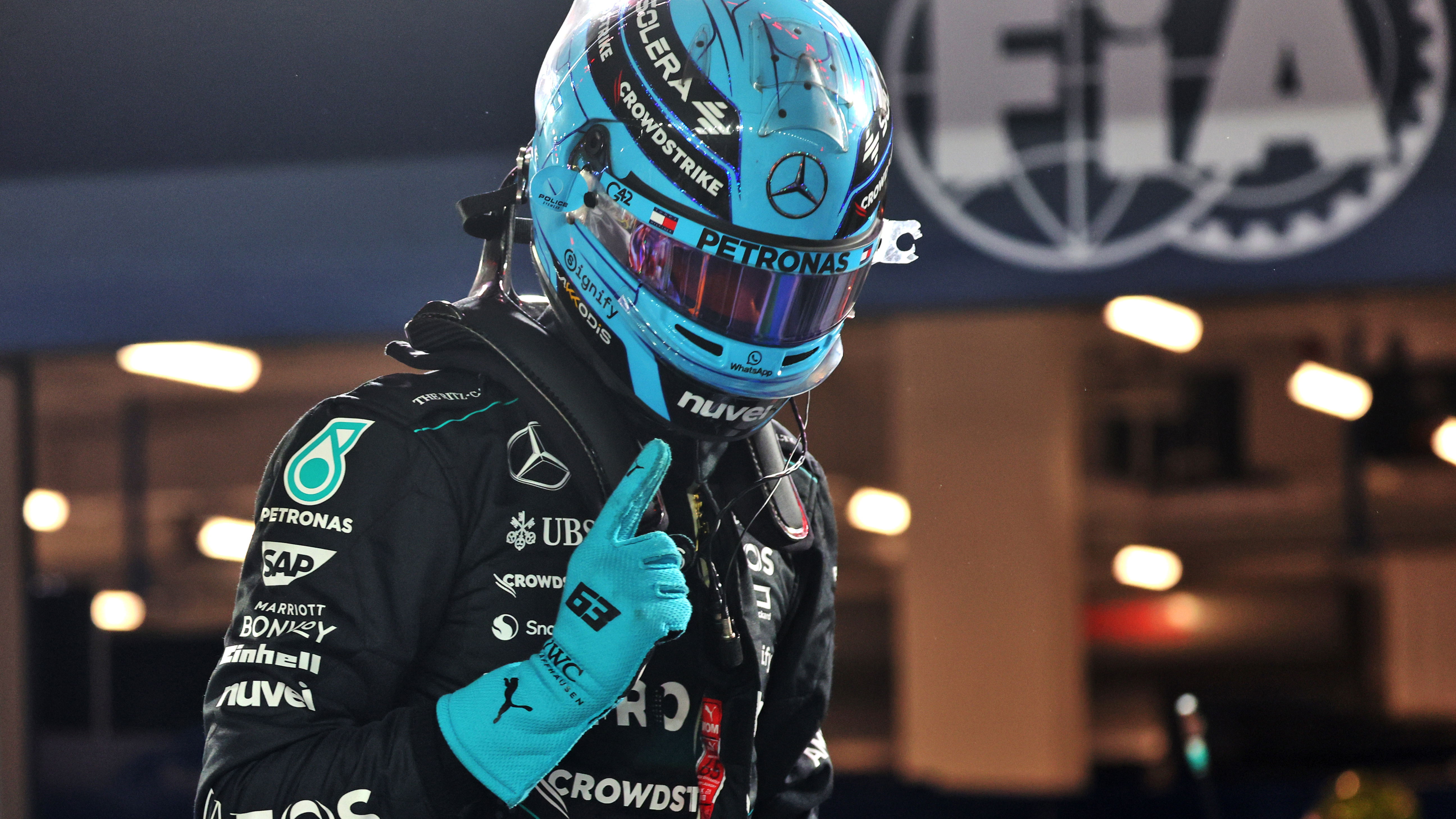 George Russell celebrates his third pole position of 2024