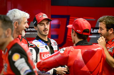 Francesco Bagnaia, Gigi Dall'Igna, Marc Marquez, 2024 MotoGP Barcelona Test, pit box. Credit: Gold and Goose