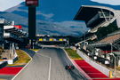 Lewis Hamilton drives down Barcelona's main straight