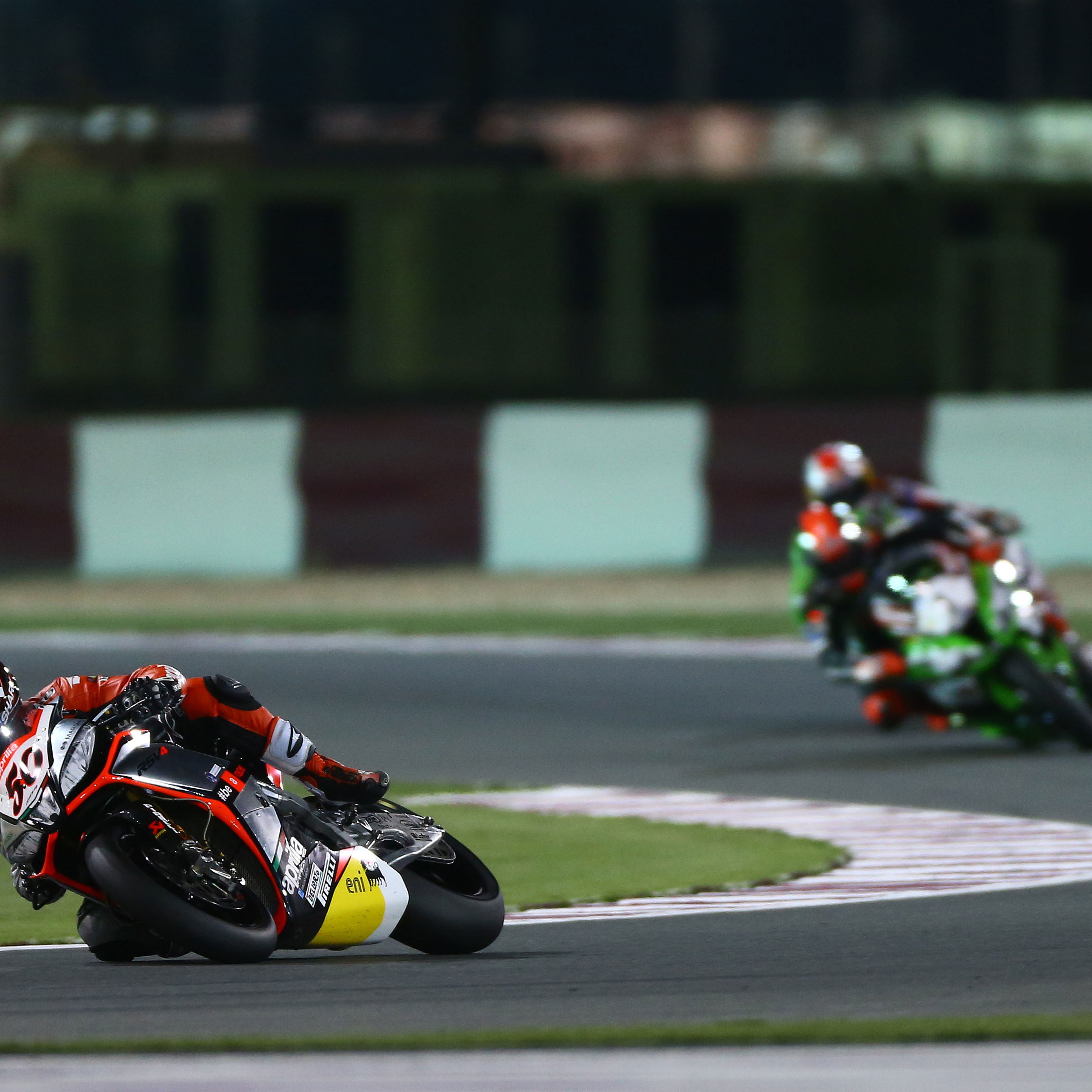Sylvain Guintoli leads WorldSBK Race 2, 2014 Qatar WorldSBK. Credit: Gold and Goose.