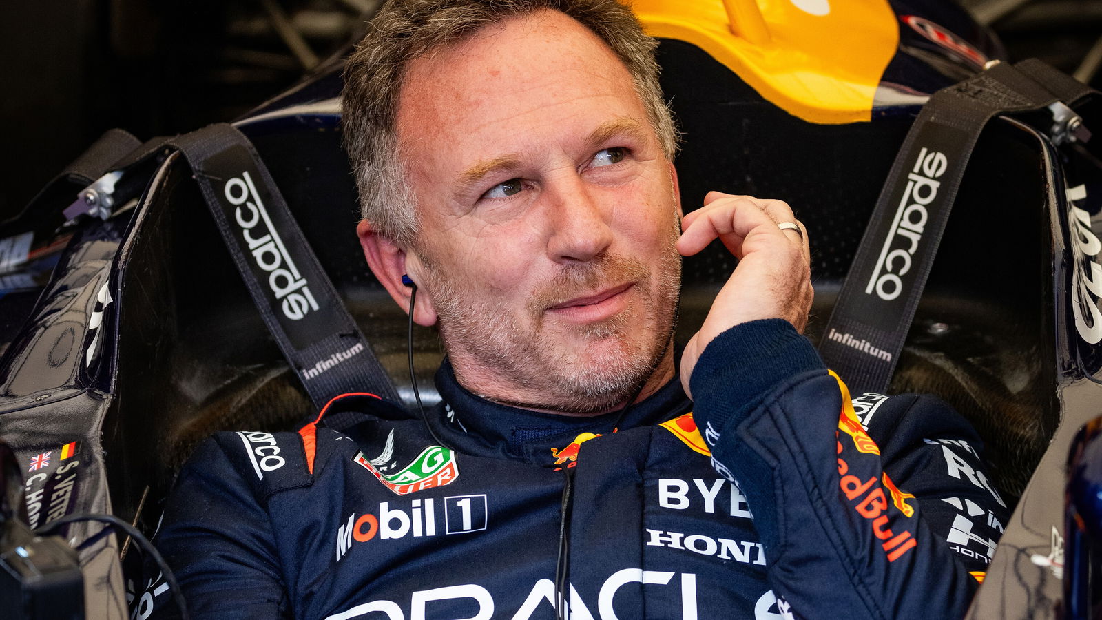 Christian Horner behind the wheel of one of Red Bull's F1 cars