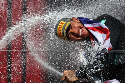 Lewis Hamilton celebrates winning last year's British Grand Prix