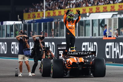 Lando Norris celebrates his victory in Abu Dhabi 