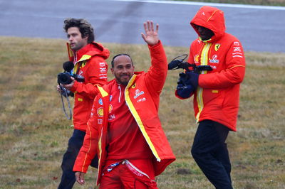 Lewis Hamilton waves to the adoring tifosi 