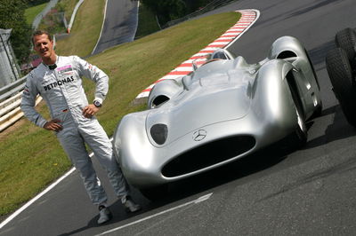 Michael Schumacher with the Mercedes 1955 W196