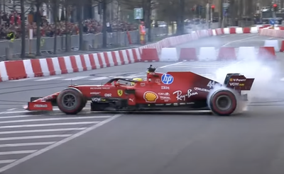 Lewis Hamilton performs donuts in Milan