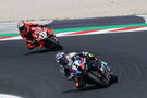 Toprak Razgatlioglu leads Nicolo Bulega, 2025 Emilia-Romagna WorldSBK. Credit: Gold and Goose.