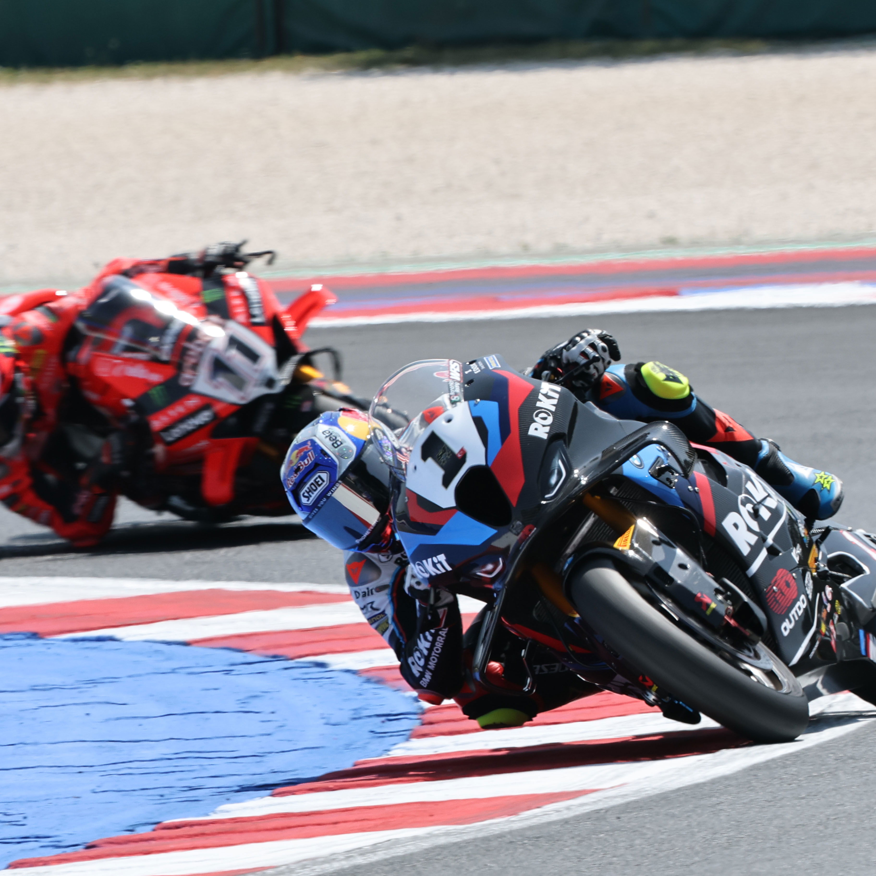 Toprak Razgatlioglu leads Nicolo Bulega, 2025 Emilia-Romagna WorldSBK. Credit: Gold and Goose.