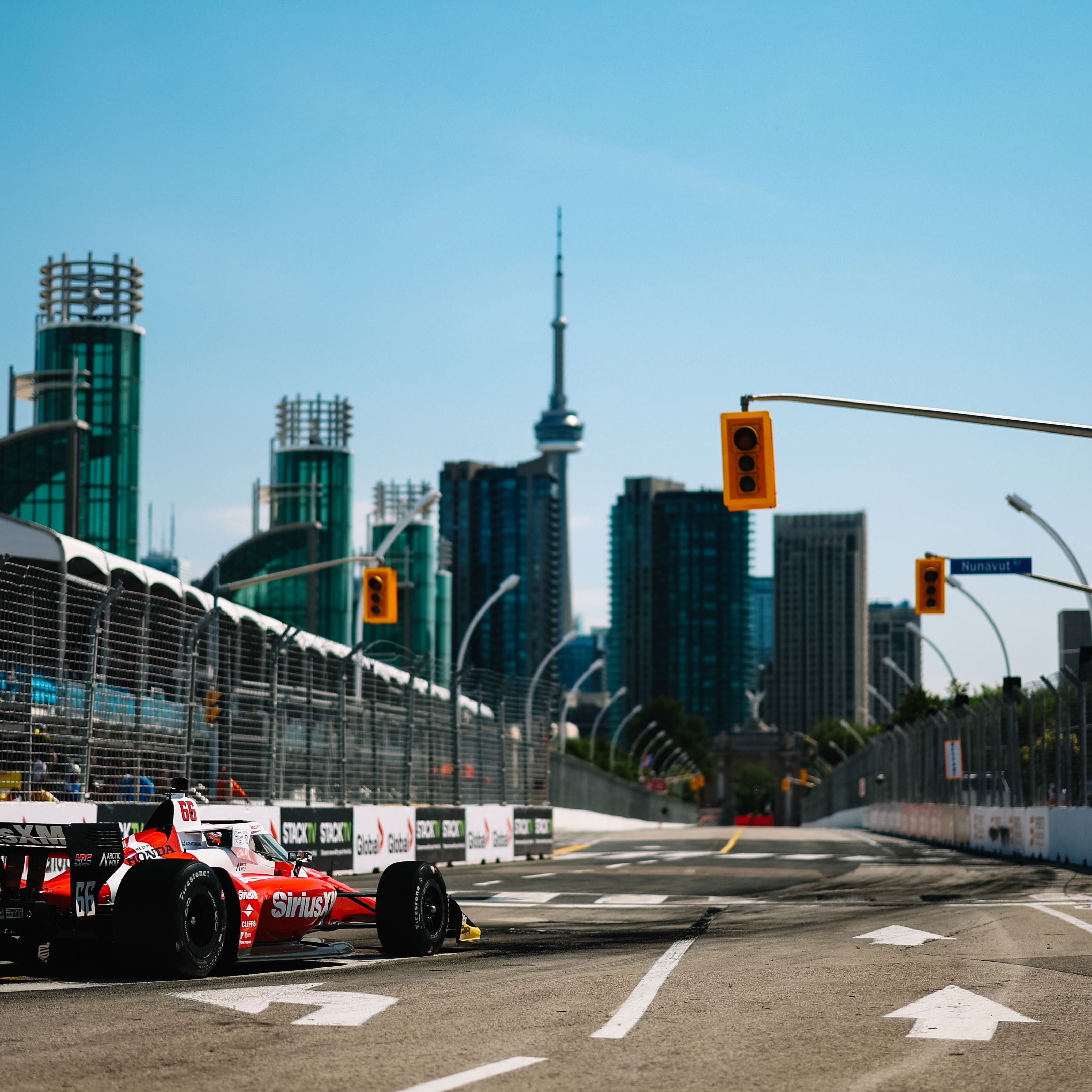 Marcus Armstrong in front of the Toronto skyline.