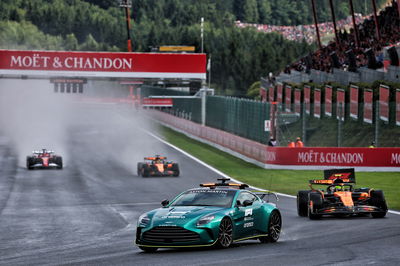 Safety car leads the field