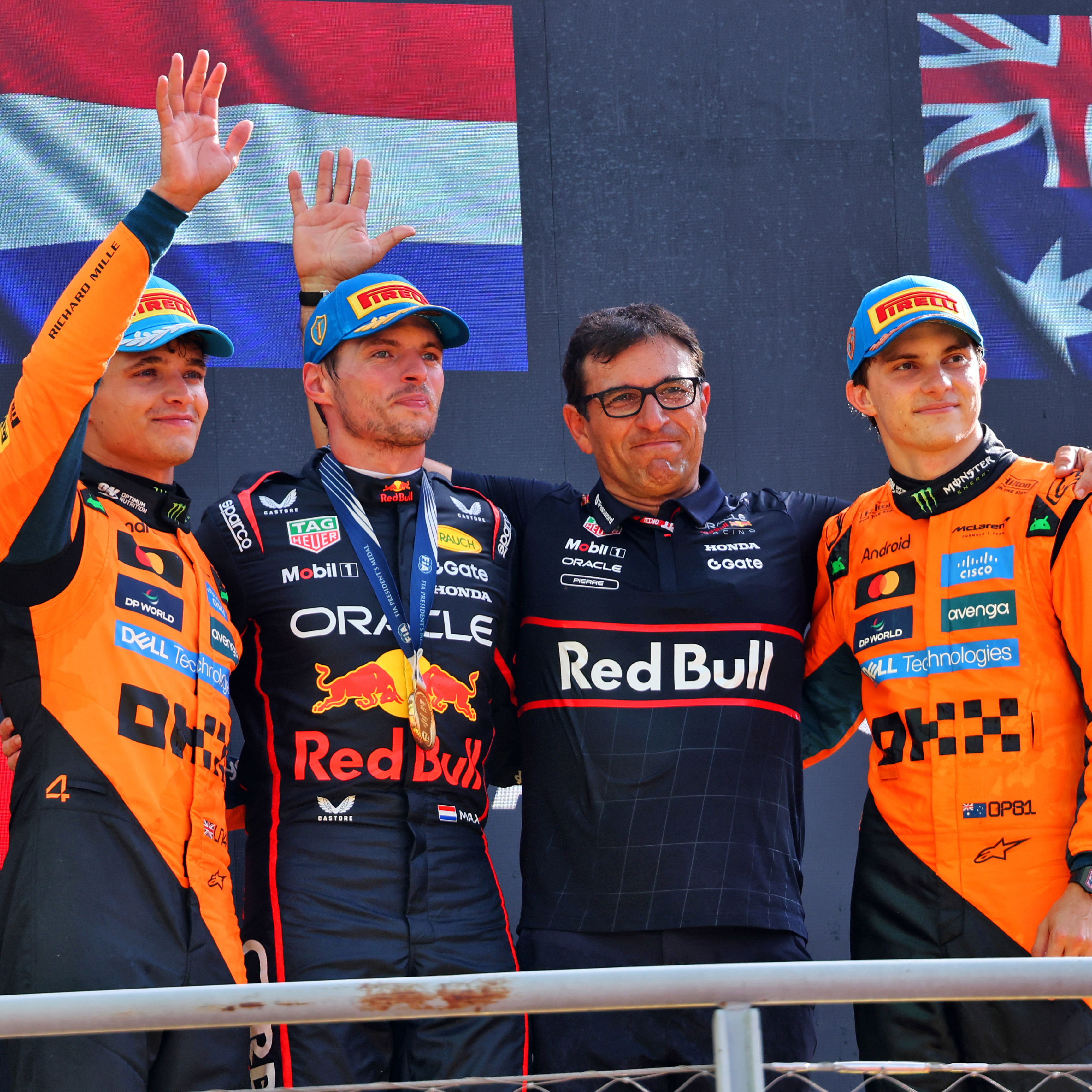Max Verstappen and Pierre Wache on the podium at Monza
