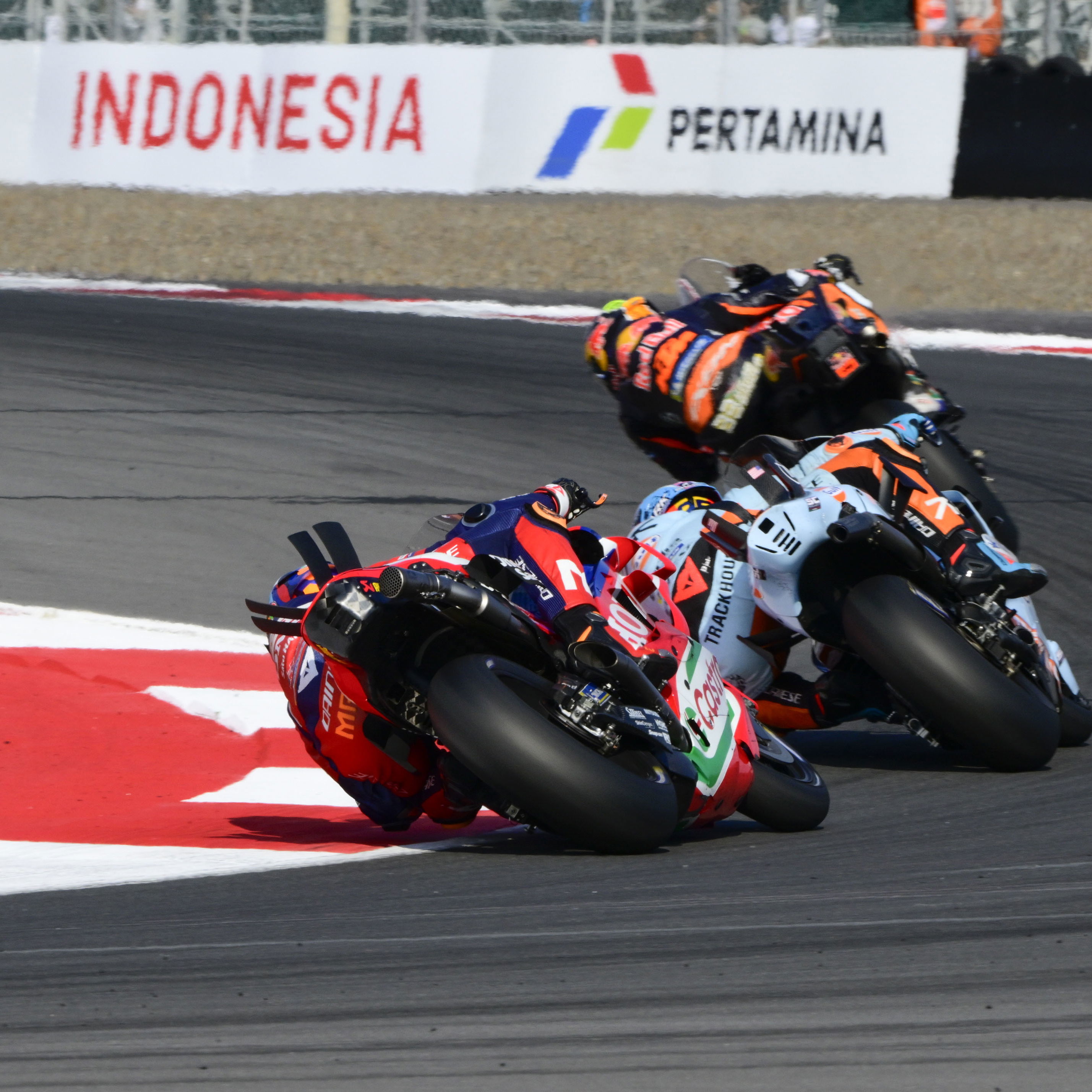 Luca Marini chases Raul Fernandez, Brad Binder, 2025 MotoGP Indonesian Grand Prix. Credit: Gold and Goose.