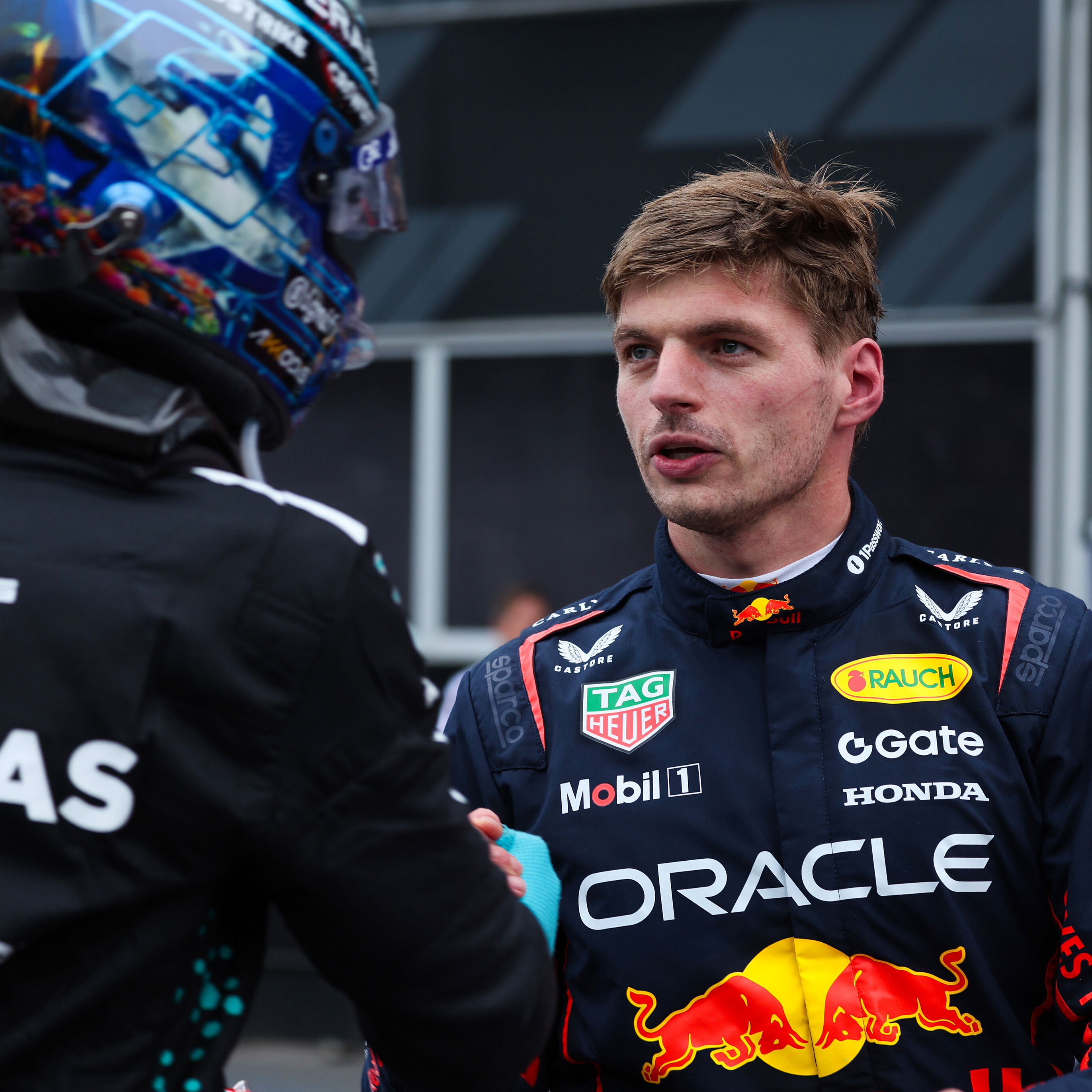 Verstappen is congratulated by Russell