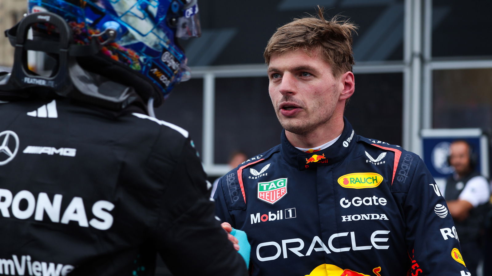 Verstappen is congratulated by Russell