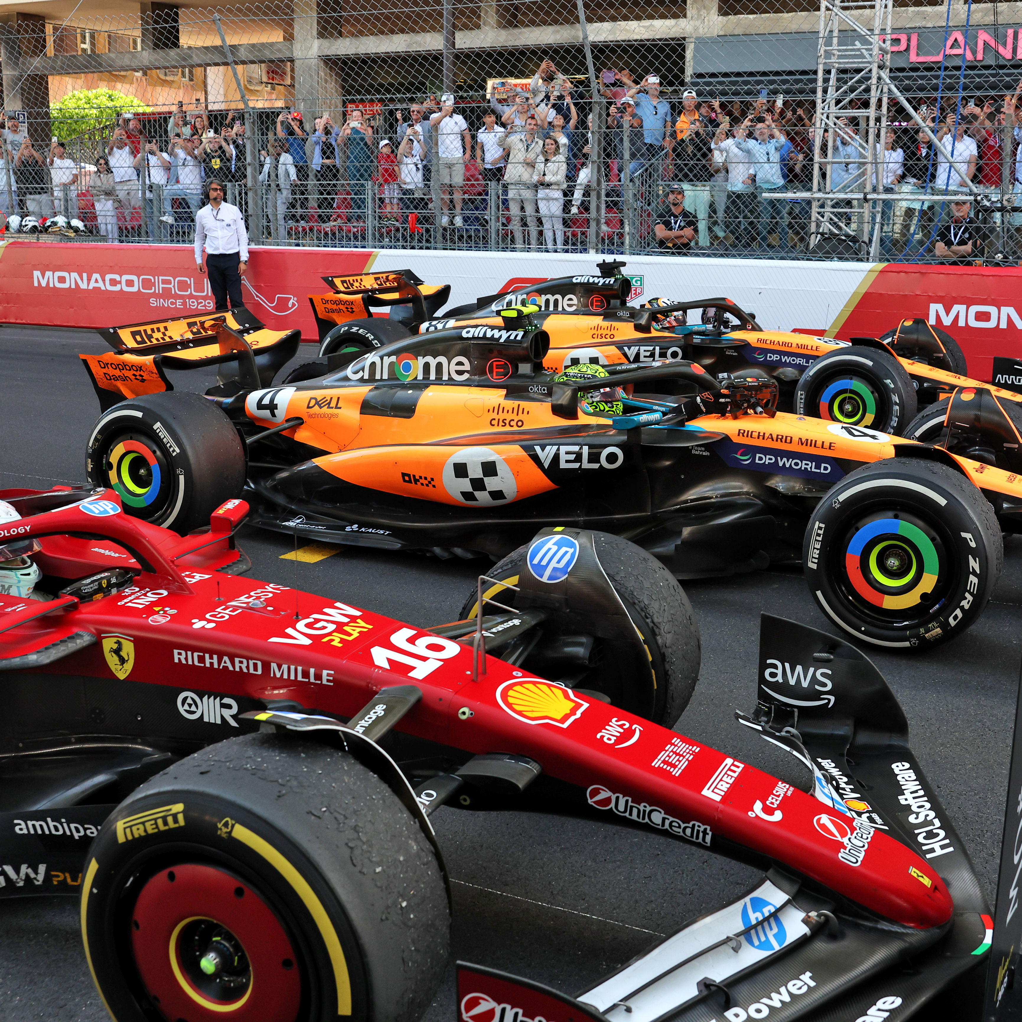 Charles Leclerc and the two McLarens 