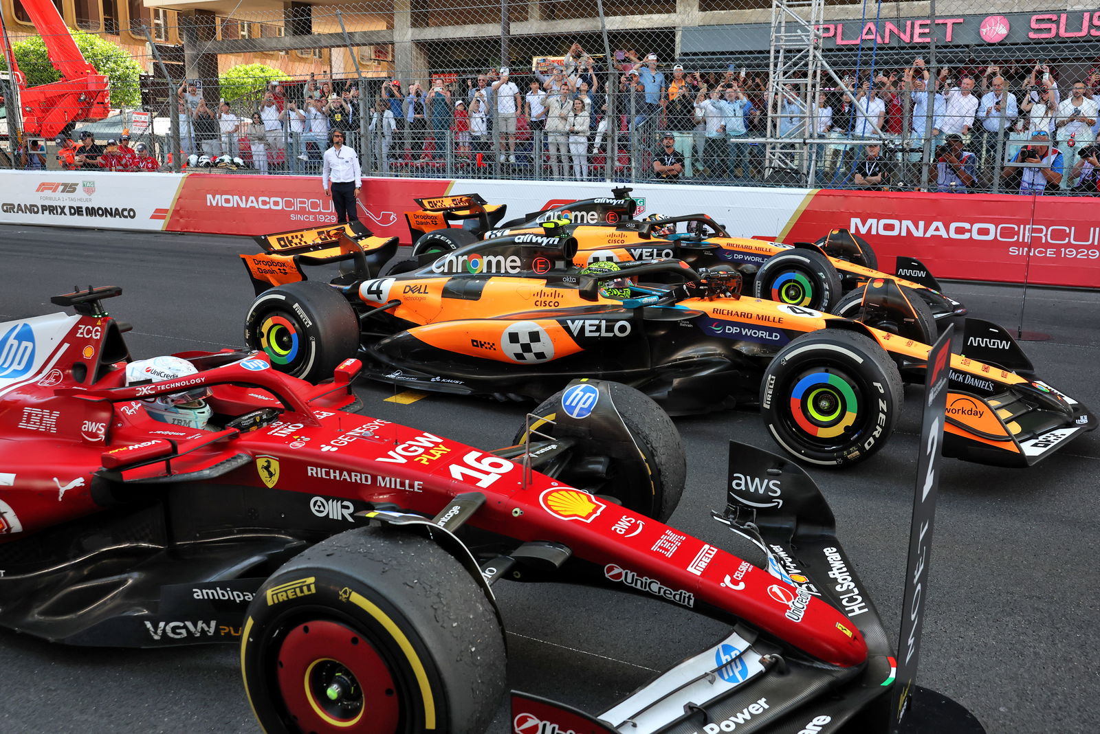 Charles Leclerc and the two McLarens 