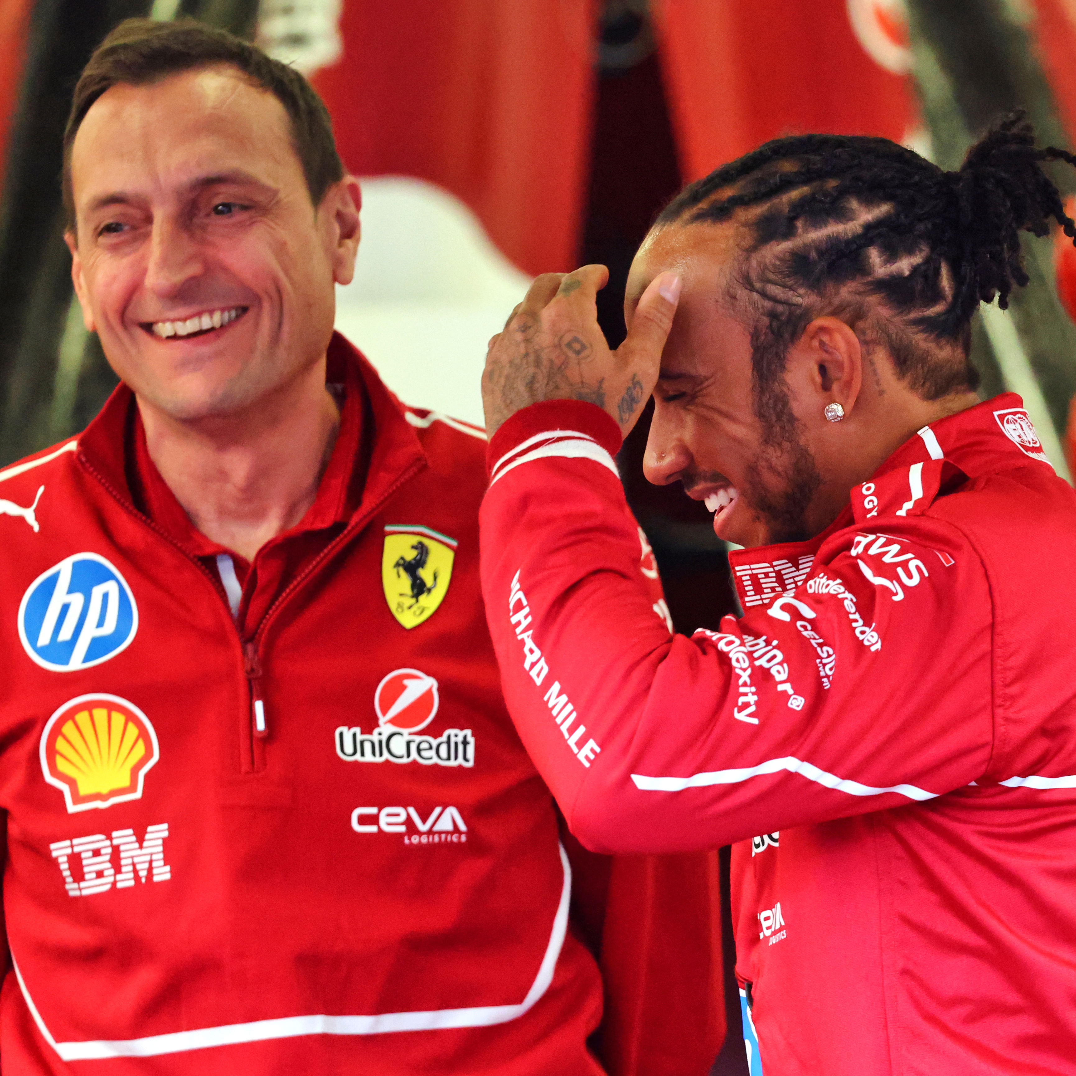 Riccardo Adami and Lewis Hamilton