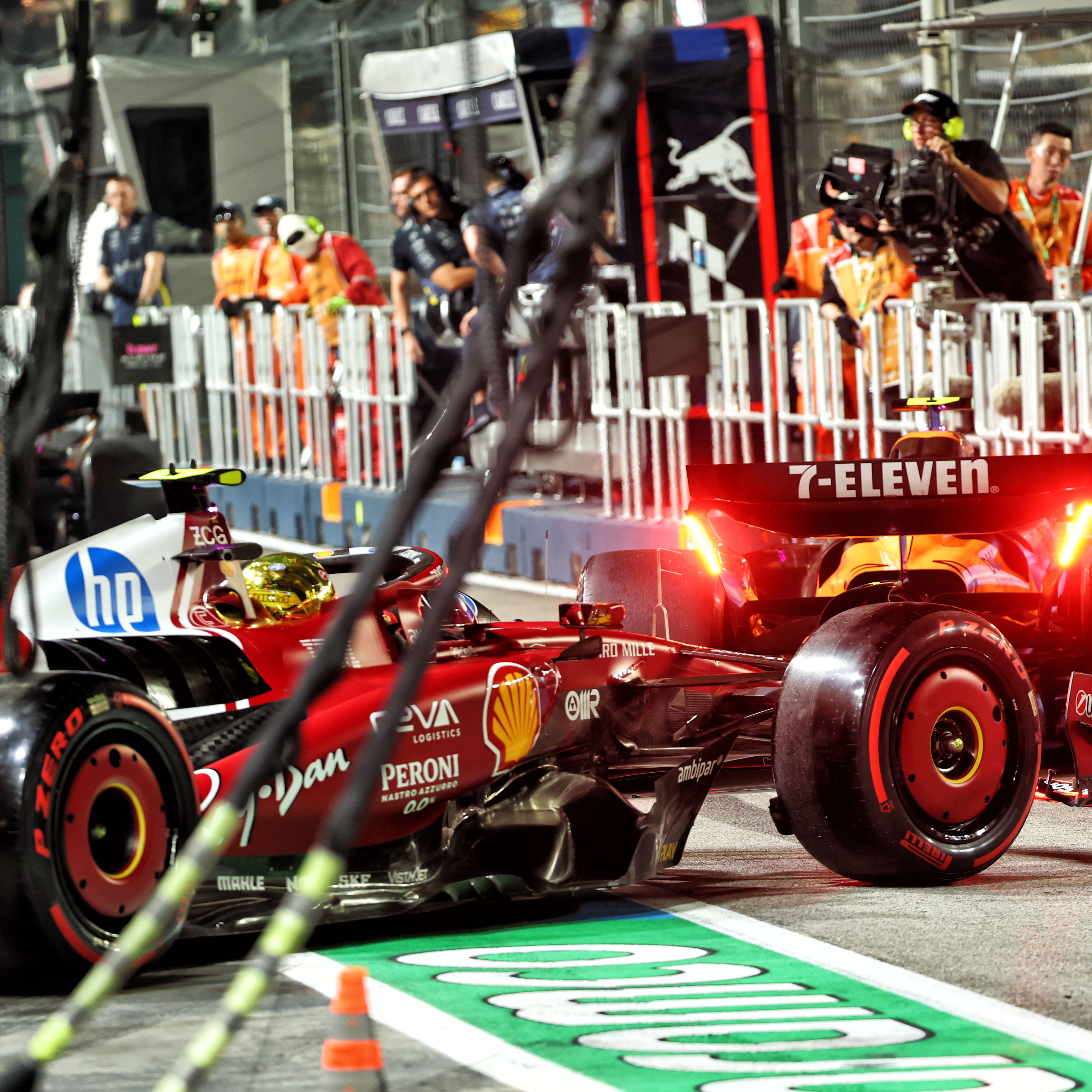 Norris was pushed into the pit wall 