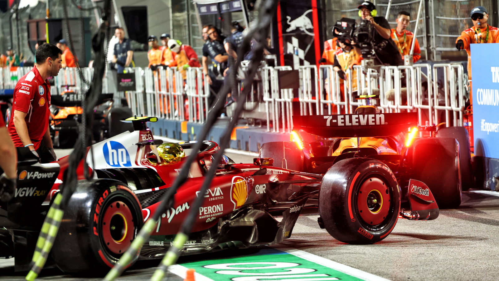 Norris was pushed into the pit wall 