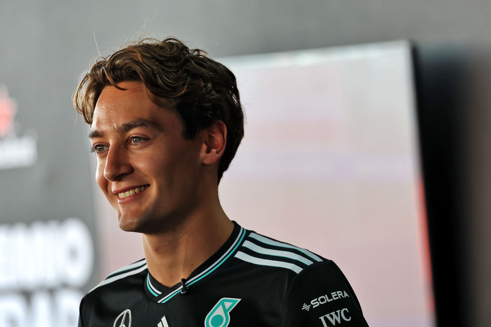 Russell watched the action from the grandstands