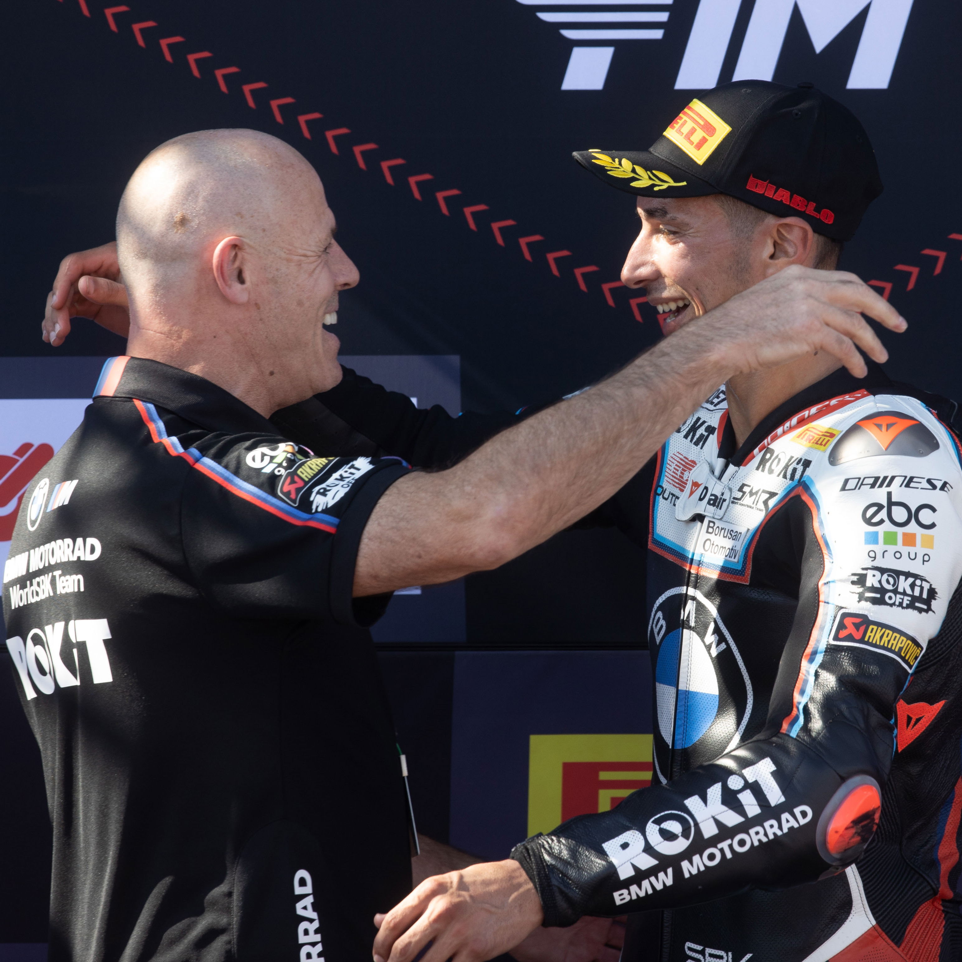 Shaun Muir, Toprak Razgatlioglu, 2025 Estoril WorldSBK, podium. Credit: Gold and Goose.