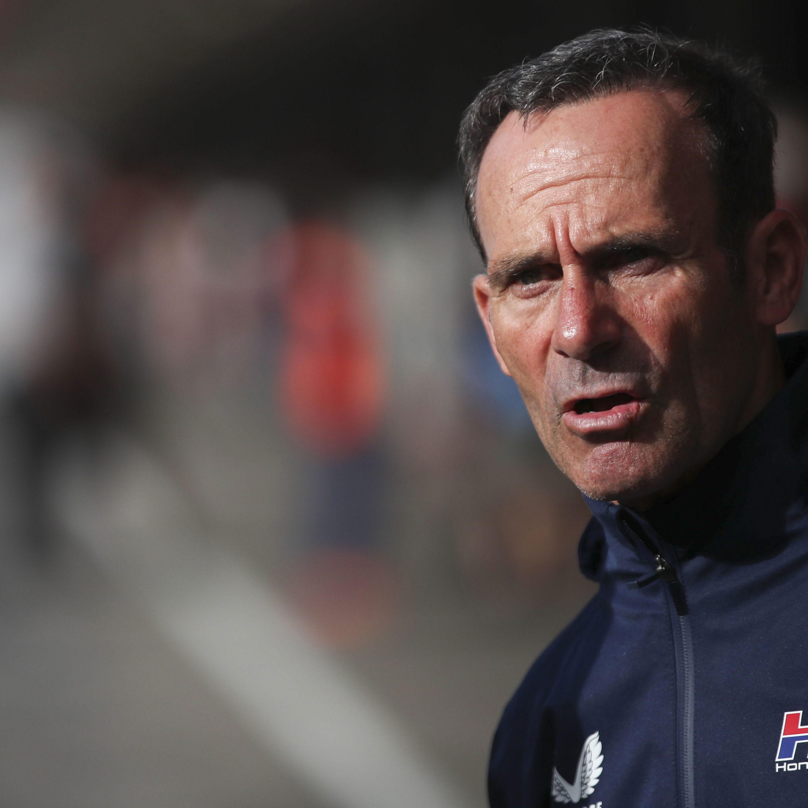 Alberto Puig, 2025 MotoGP Portuguese Grand Prix, pit lane. Credit: Gold and Goose.