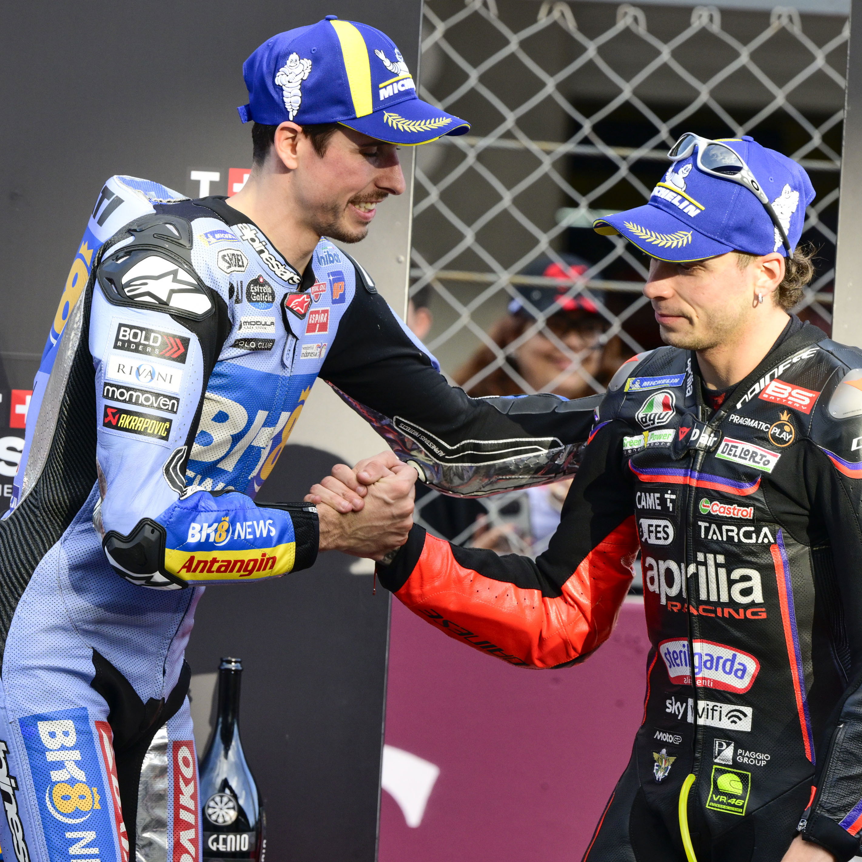 Alex Marquez, Marco Bezzecchi, 2025 MotoGP Portuguese Grand Prix, Sprint podium. Credit: Gold and Goose.