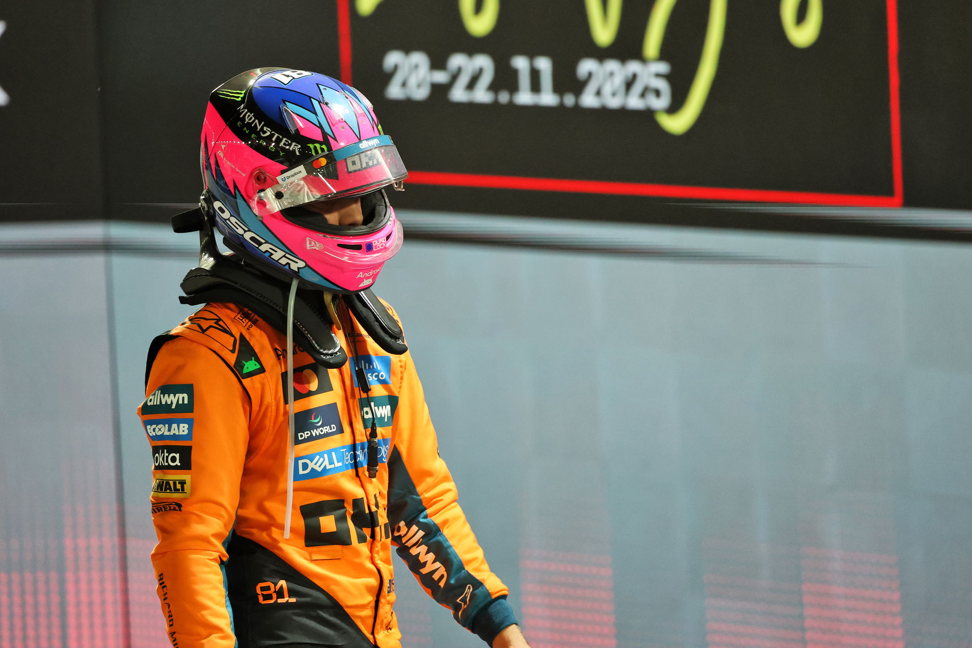 Piastri looks down and out.