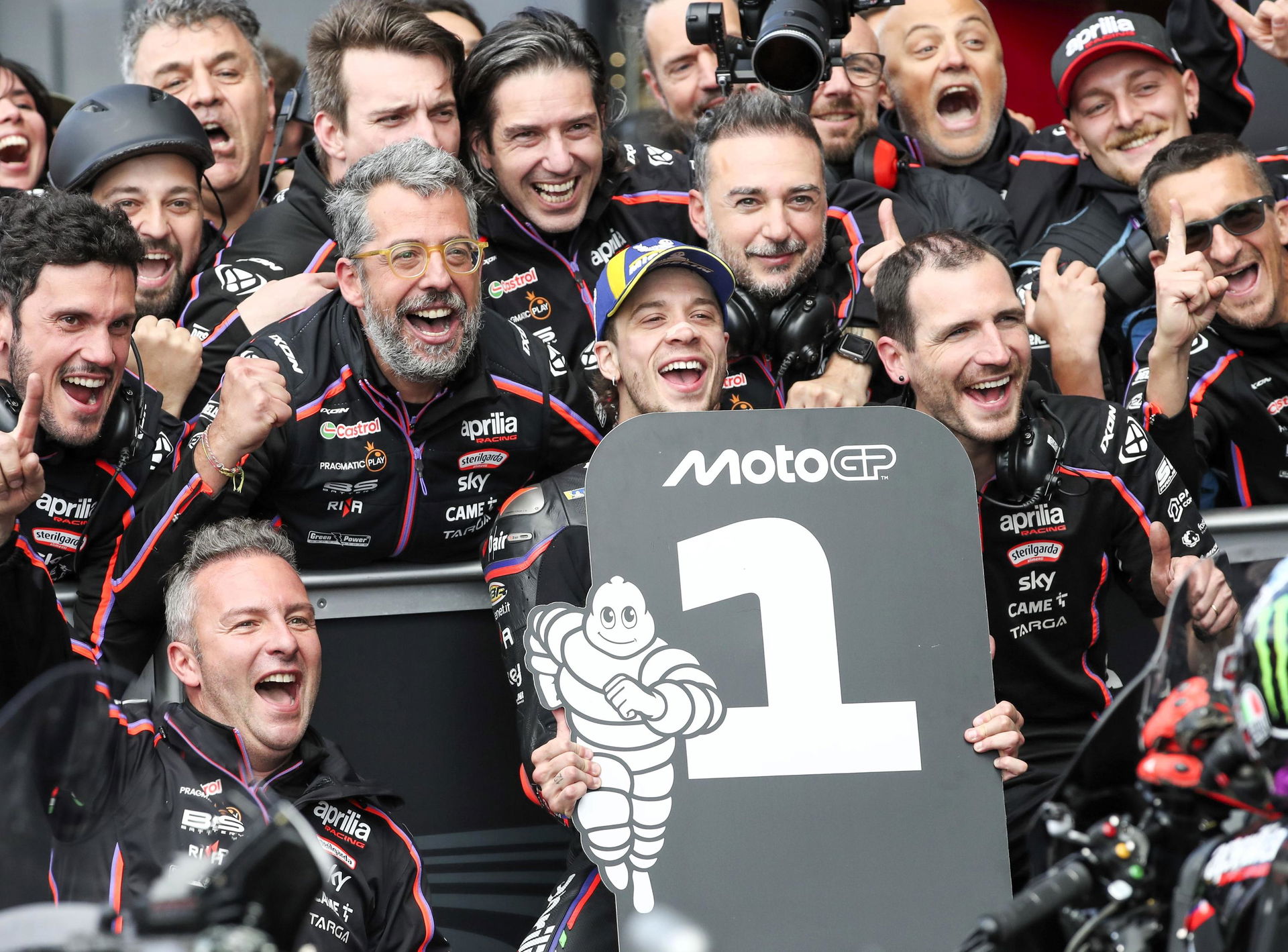 Aprilia's Marco Bezzecchi celebrates his victory at Silverstone.