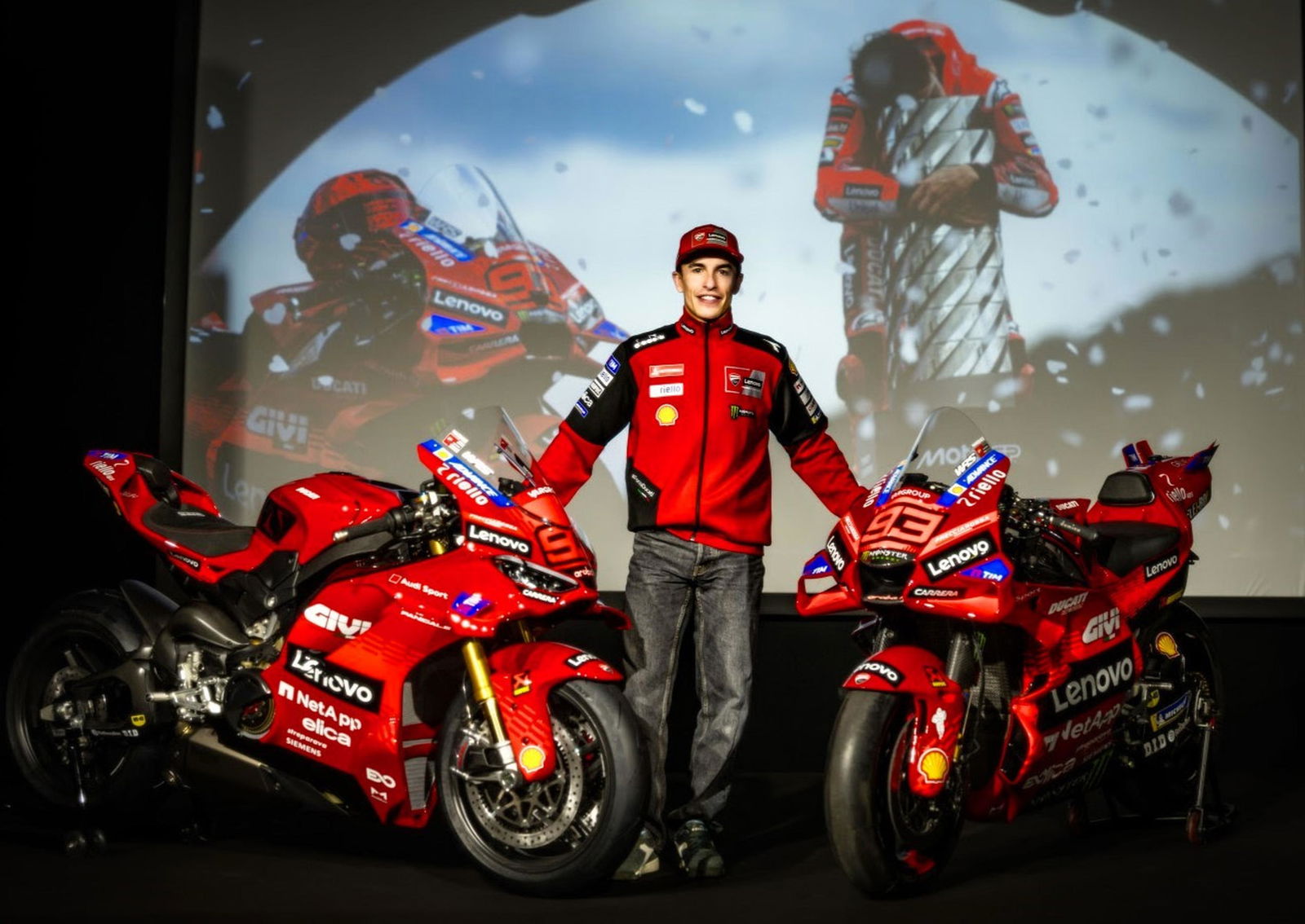 Marc Marquez with his Desmosedici GP25 and Panigale V4 replica.