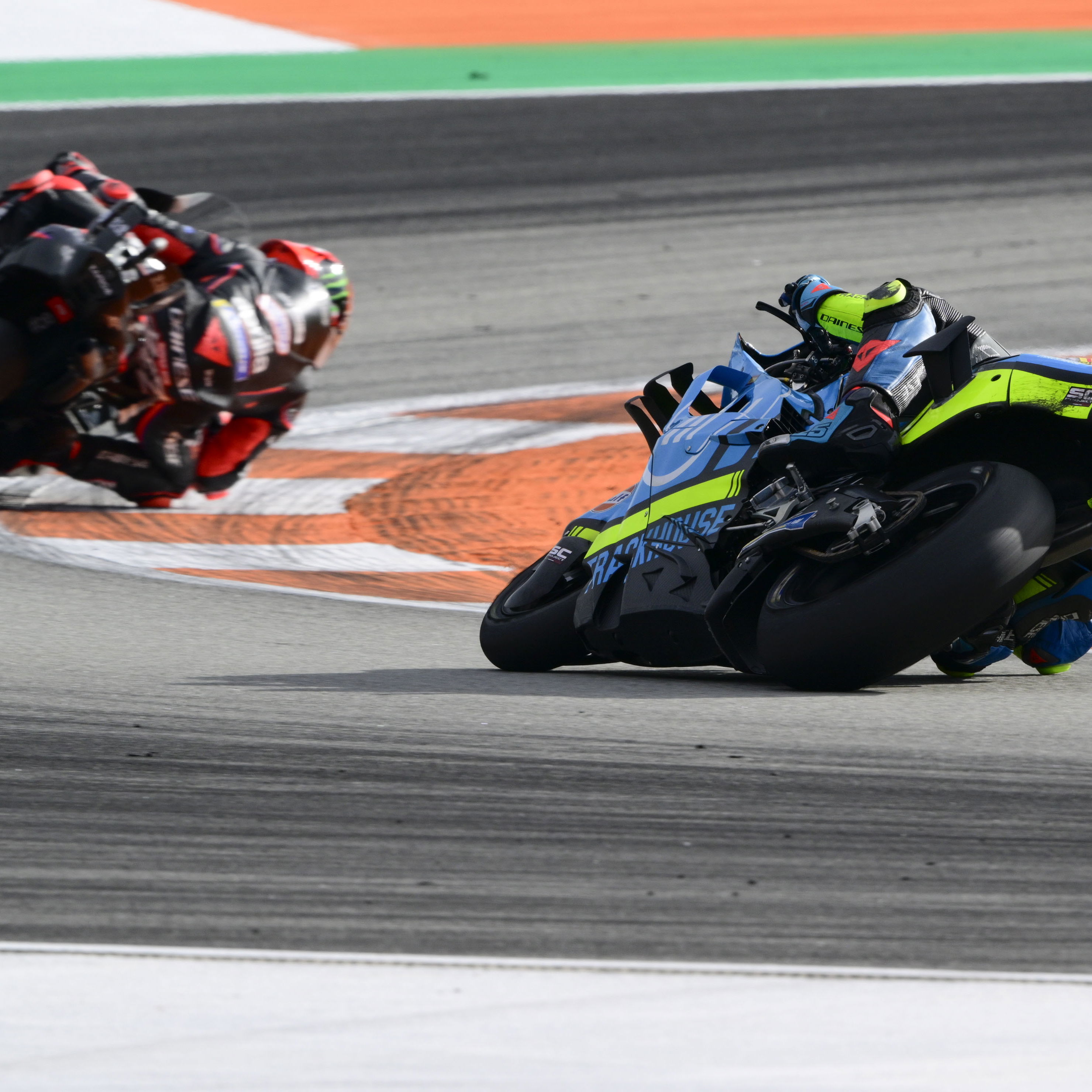 Raul Fernandez chases Marco Bezzecchi, 2025 MotoGP Valencia Grand Prix. Credit: Gold and Goose.