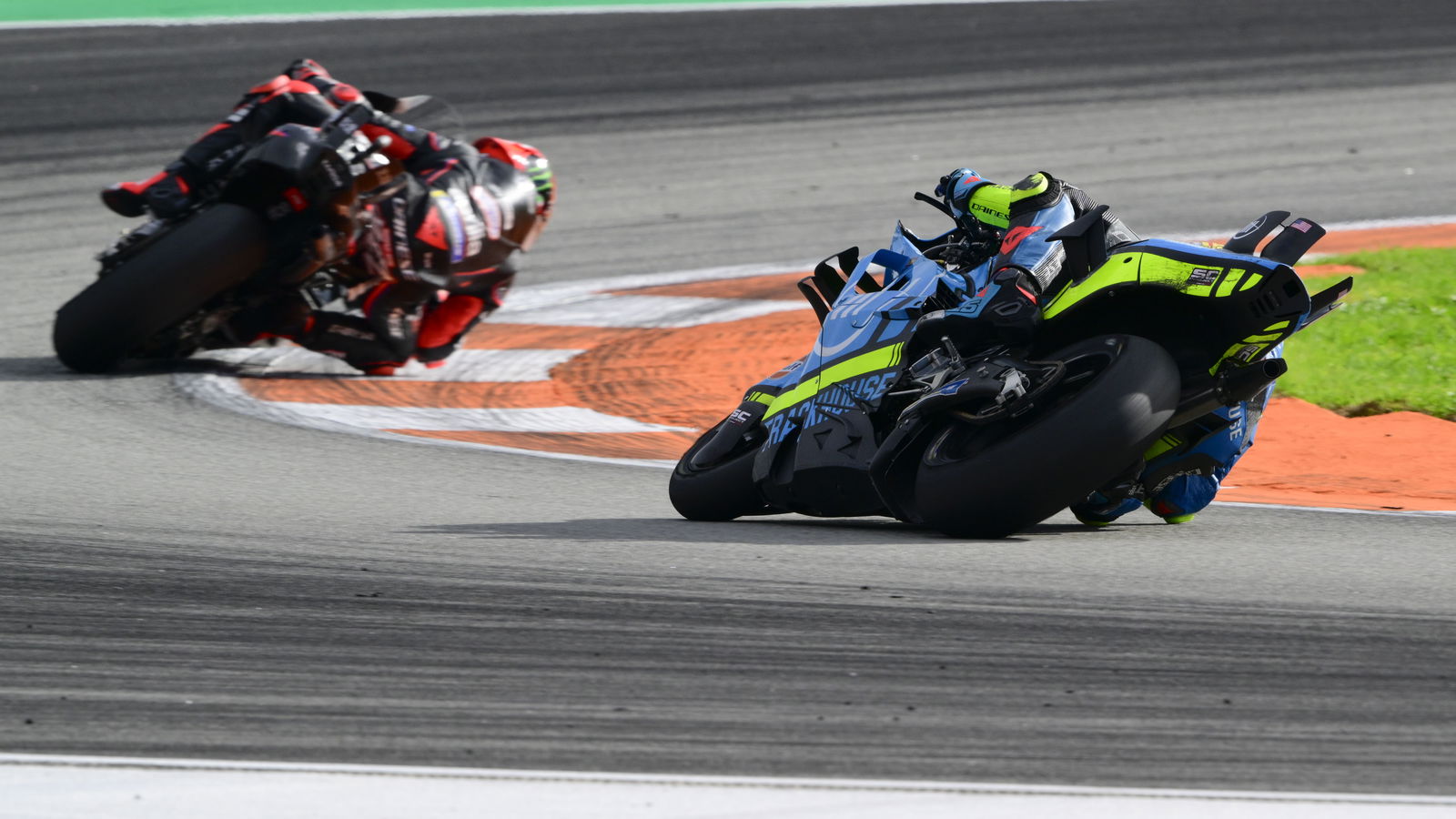 Raul Fernandez chases Marco Bezzecchi, 2025 MotoGP Valencia Grand Prix. Credit: Gold and Goose.