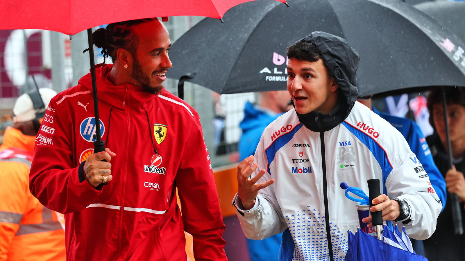 Lewis Hamilton and Isack Hadjar 