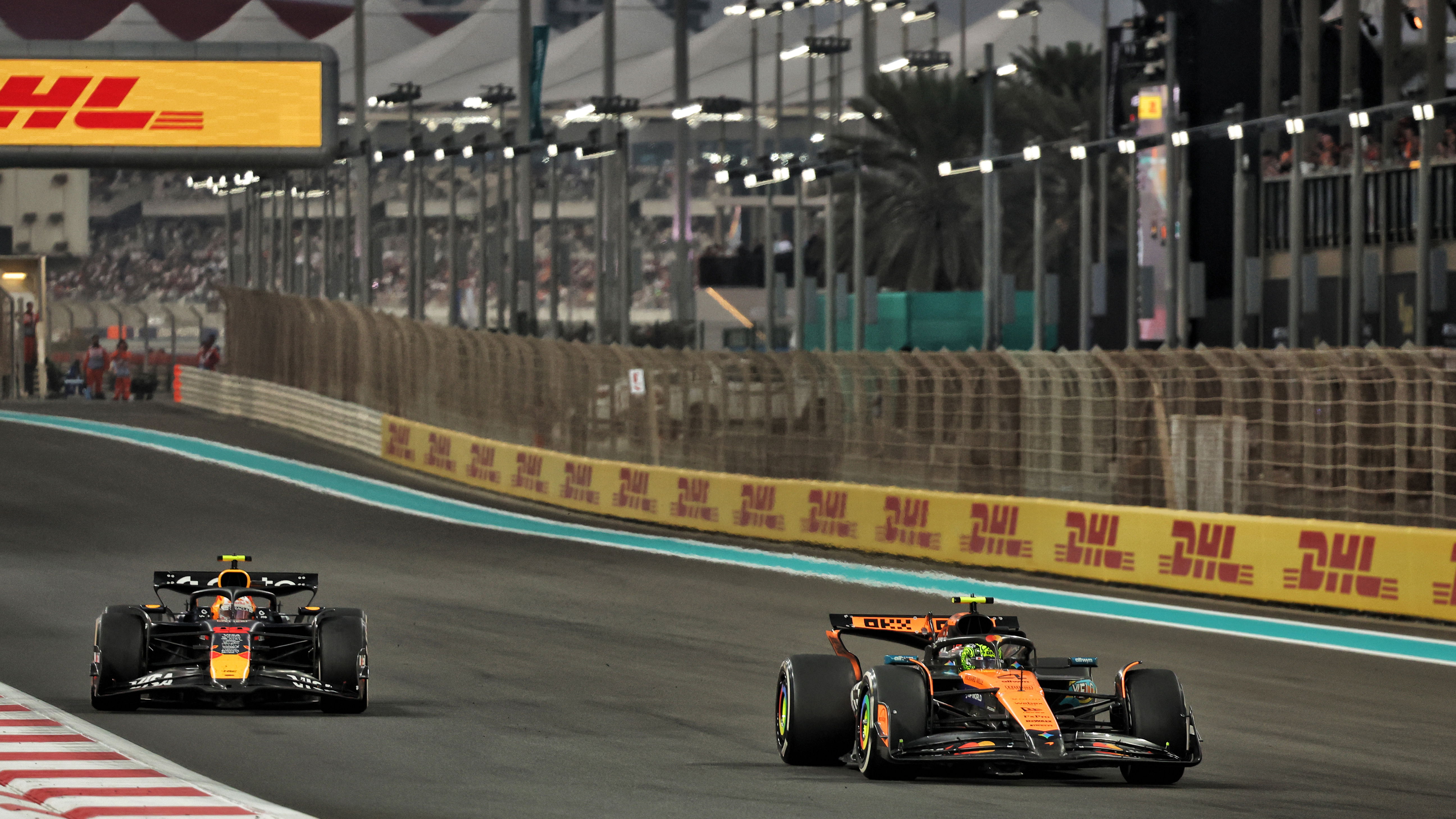 Yuki Tsunoda and Lando Norris battle in Abu Dhabi