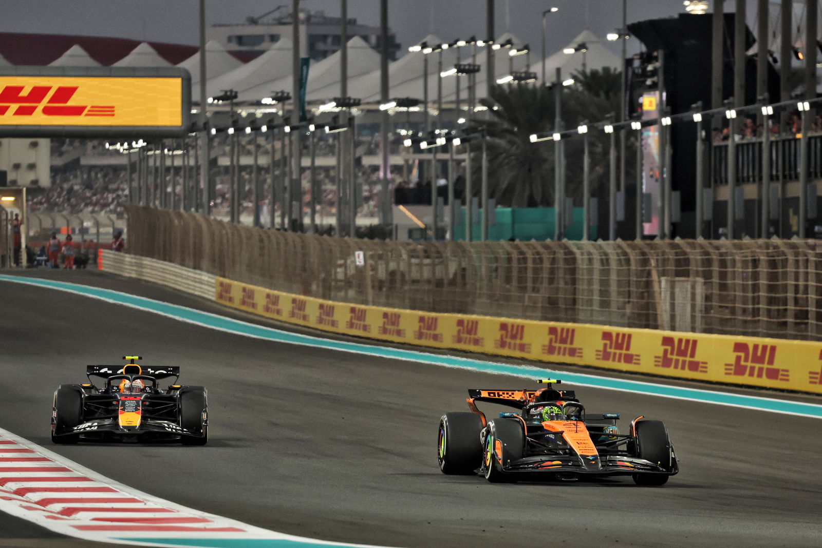 Yuki Tsunoda and Lando Norris battle in Abu Dhabi