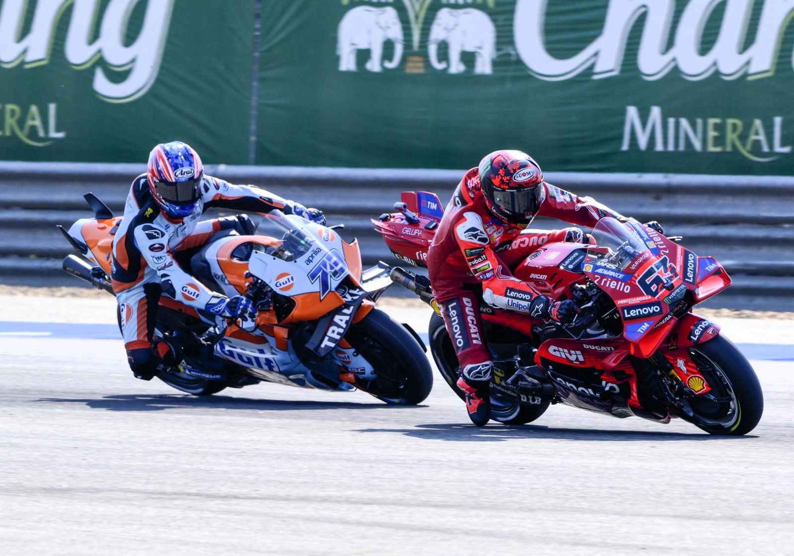 Ai Ogura chases Francesco Bagnaia, 2025 Thai MotoGP Sprint.