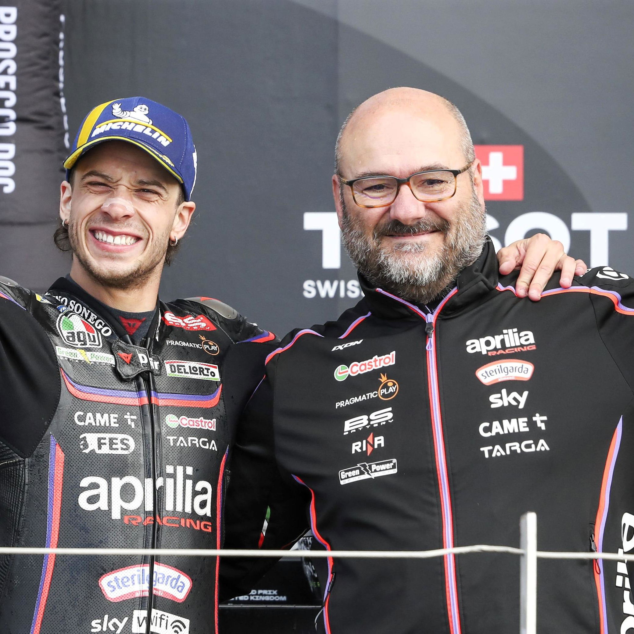 Marco Bezzecchi and Fabiano Sterlacchini celebrate a 2025 MotoGP victory.
